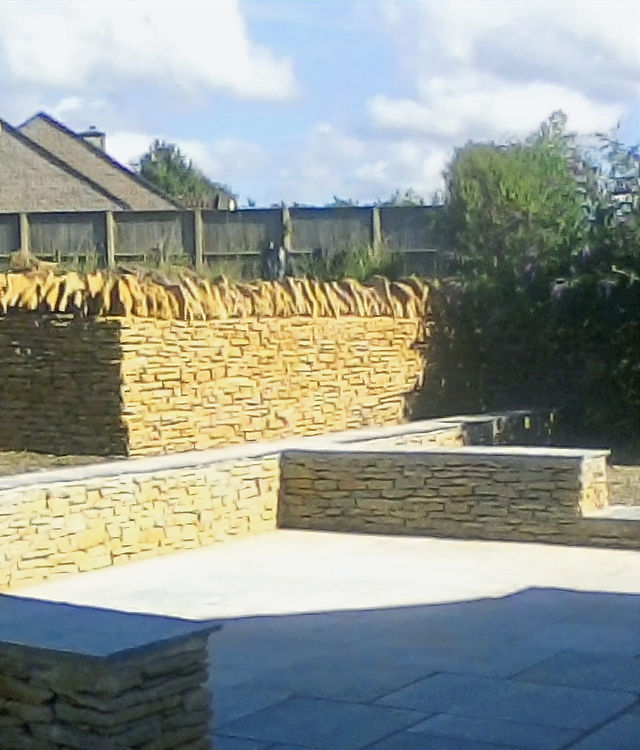 A new stone terrace held by low dry stone walls